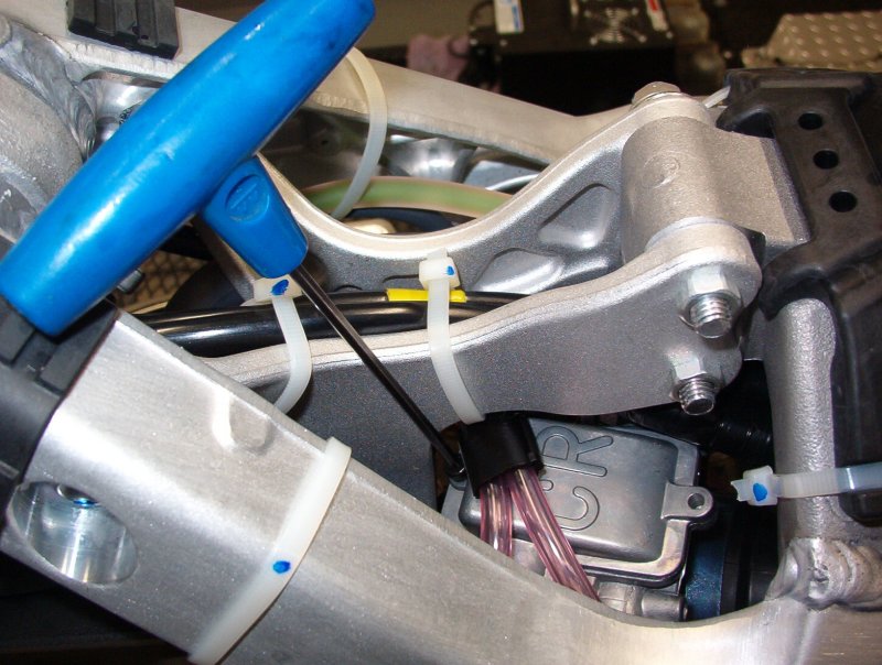 Accessing the carburetor needle on the WR250F