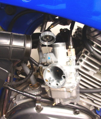 Pull carburetor to side for rejetting