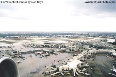 1999 - Aerial view of Miami International Airport from United Airlines B777-222ER N792UA taking off