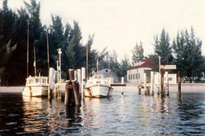 1973 - CG-30592 and CG-40485 at the docks at Coast Guard Station Lake Worth Inlet