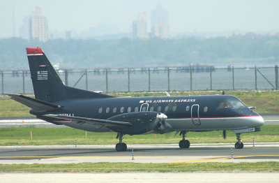 US Airway Express SAAB-340 taxi towards the runway, LGA, May 2007