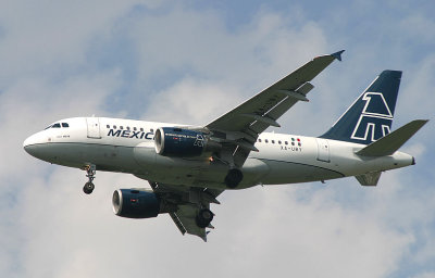 The smallest member of the A-320 family, Mexicana's A-318 landing in JFK