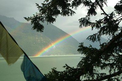 Double rainbows framed by the prayer flag