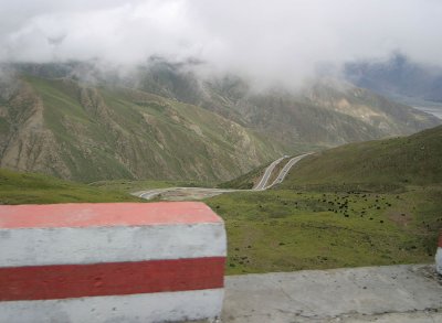 The road and the yak on the mountain