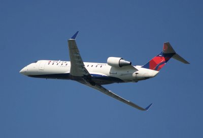 CRJ in Delta's latest livery taking off LGA RWY 31