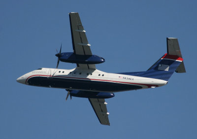 Dash-8 in US Airways' new livery taking off LGA RWY 31