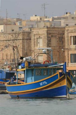 Marsaxlokk boat and buildings