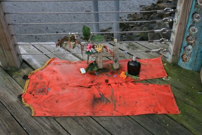 A tribute to a fallen fisherman at Newport harbor