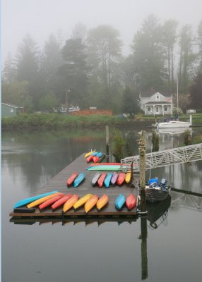 Colorful kayaks in Shamokawa, WA, early AM.  Driving around Astoria in early AM in the fog was wonderful!