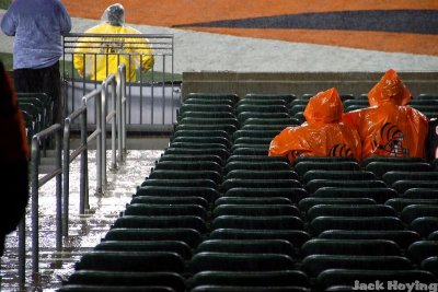 Die-Hard fans waiting for the game to start on a rainy night
