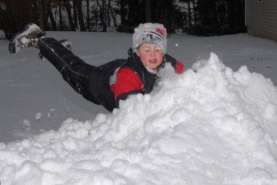 Diving into a snow pile
