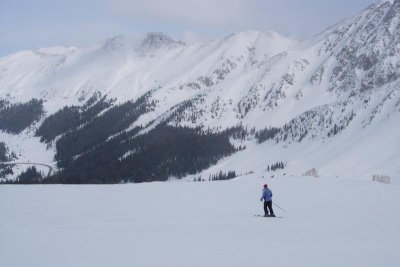 Brenda heading down an upper trail