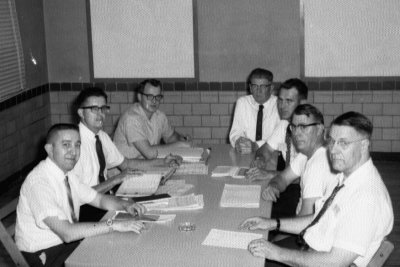 Convention meeting, Clem Poeppelman (center), Henry Seger (second from right)