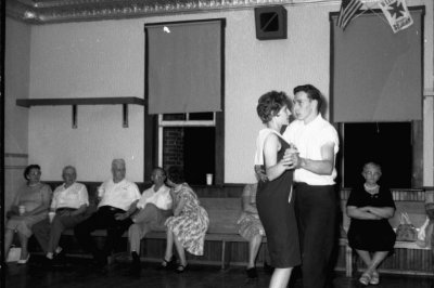 Gilbert Hilgefort (seated with leg crossed), Edna & Fred Bruns dancing
