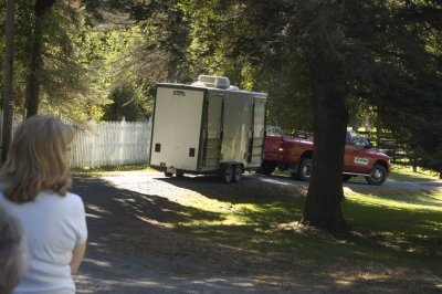 Port a potty arrives - Heather supervising