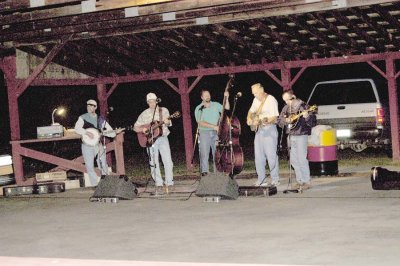 Karl's cousins, brother, and father have a Blue grass band