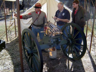 Explaining how the Gattling Gun worked, and how each Black powder cartridge was hand loaded