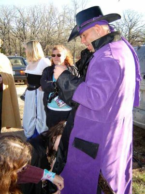 Uhhhhhhhh Hans. What is going on here. wait. they are just finishing the sewing on your coat. Thought you were a being bad