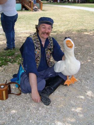 A man and his goose! The parade is about to start