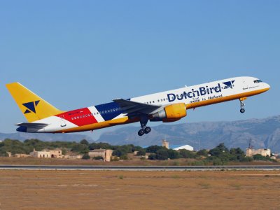 Climbing off 06R at Palma De Mallorca, but Airline unfortunately defunct now, other aircraft in the fleet was the A320.(See image also).