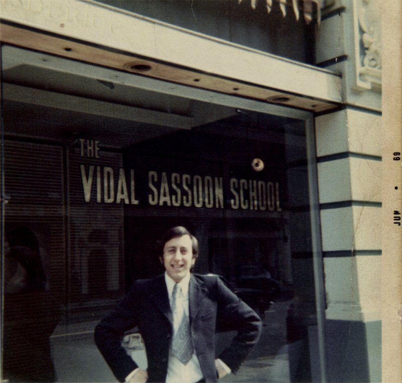 Santilli at his work place, before the school moved to Davies Mews modeling one of Reggies Kipper ties
