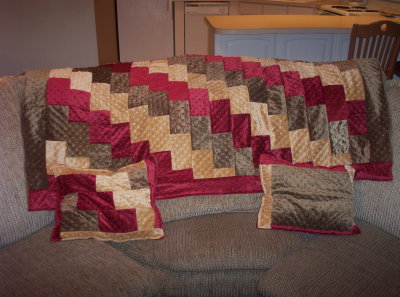These next pictures show finished products of some of the larger items made there.  The (reversible) pillows are similar to each other, with this photo showing what both sides looked like.