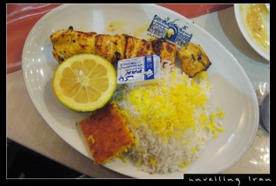 Barbecue Chicken served with Butter, Orange and Rice