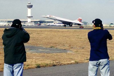 Mike McLaughlin and Carlos Borda shooting a British Airways Concorde takeoff