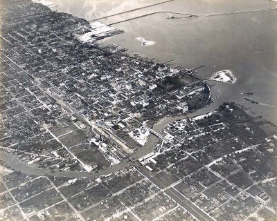Early 1920's - Aerial view of Miami River, Downtown Miami, and Biscayne Bay shoreline
