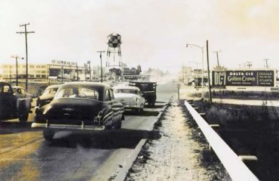 1955 - NW 36 Street east of Miami International Airport with old Delta C&S billboard on the right side