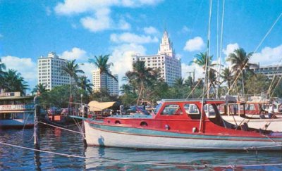 1950's - Fishing boats and the Jungle Queen tour boat at Pier 5 downtown Miami