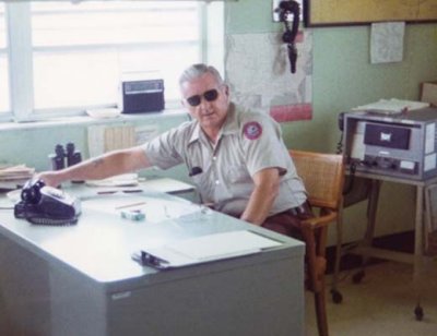 1976 - DCAD Airfield Clerk Ray Ulrich at the old Station II (20th Street Ramp Office)