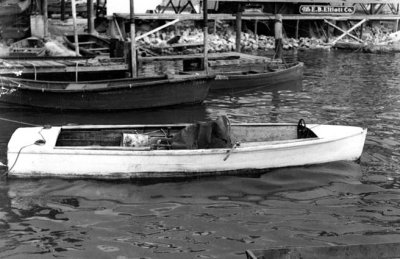1952 - Burl Grey's boat at a dock at Barney's Bayshore Boat Rentals and where the Miami Herald later built on the bay