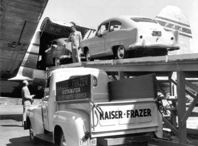 1951 - two Henry J's being loaded onto a Pan American Cargo Clipper C-46 at Miami