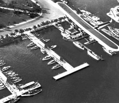 1930 - Pan American Airways System Consolidated Commodore passing over piers of Miami yachting clubs
