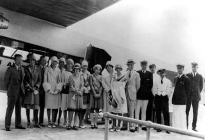 1929 - the Burdine Fashion Show group posing in front of a Pan American Airways System aircraft  in Miami