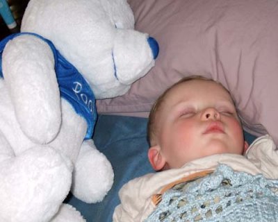 March 2007 - Kyler sleeping on our floor after a busy day