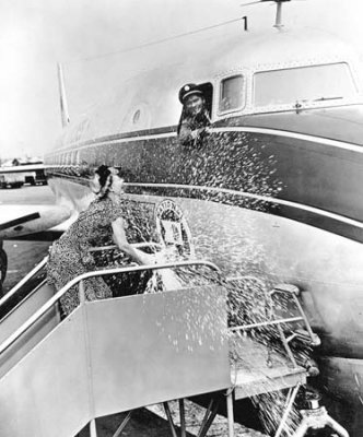 1947 - June Knight christening National Airlines DC-6