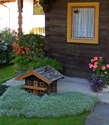 THE LITTLE HOUSE IN THE GARDEN