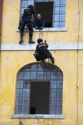 Rappelling through a window