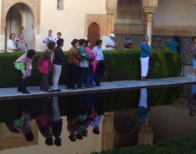 tourists flock to the alhambra