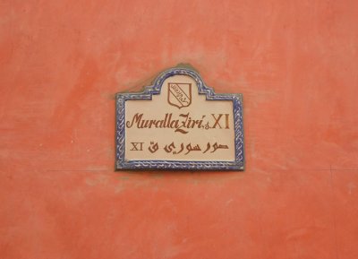 sign on a wall in granadas muslim quarter