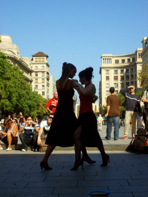tango dancers on a street in barcelona