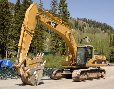 Will and a big excavator, the bucket's much bigger than him