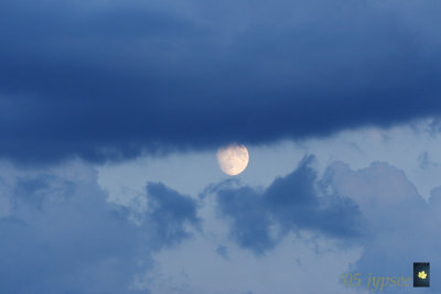 slipping behind the clouds