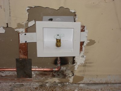installation of outlet for water for dispenser in new refrigerator.JPG