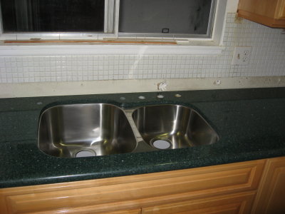 new countertop with new sink partly installed.JPG