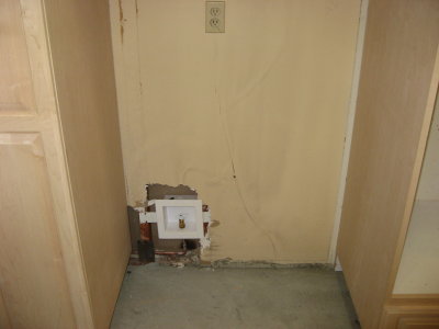 refrigerator alcove before drywall repair.JPG