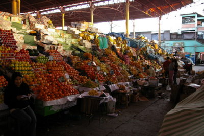 Fruit stand in large indoor market