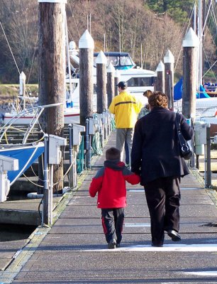 Hunter & grandma walking to Alan & Pattis boat